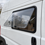 VanLight push-out window installed on a white van, opened