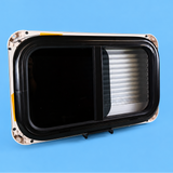 NORDVAN VanSlide sliding window installed in a campervan