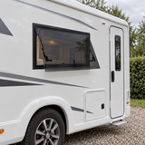 VanSquare window installed on a flat motorhome wall — illustration